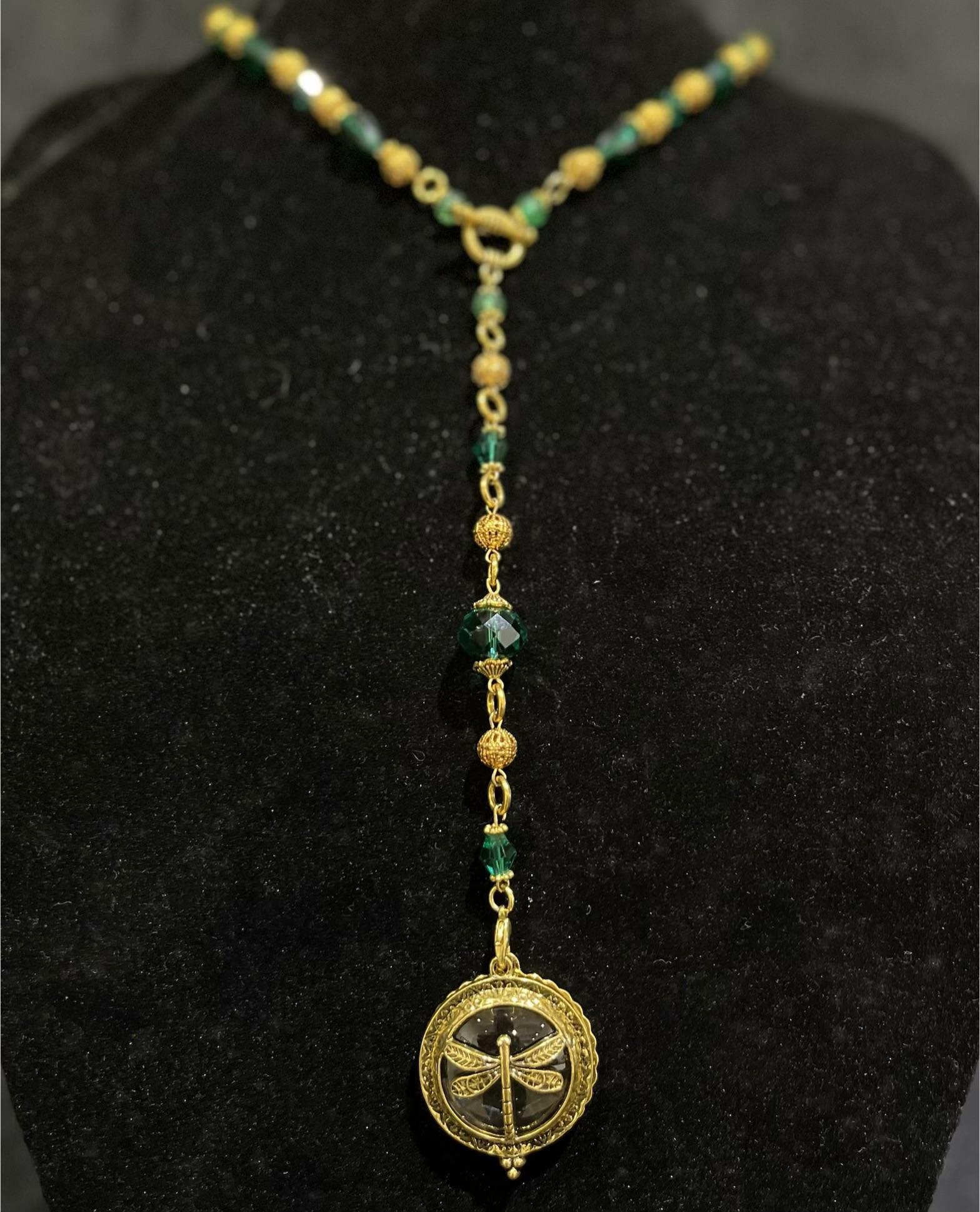 Shelley Silverlight - Egyptian hollow gold bead with emerald and green Czech glass Gold plated chain and magnifier pendant